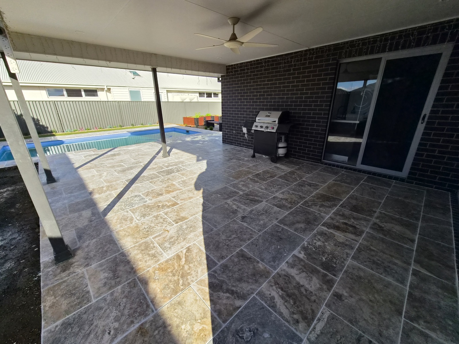 A paved alfresco area by MR Landscapes