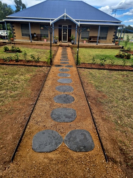 A designed stepping-stone path and garden built by MR Landscapes in Dubbo