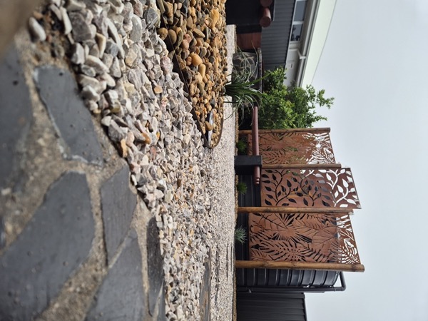 A feature screen and crazy paving by MR Landscapes in Dubbo