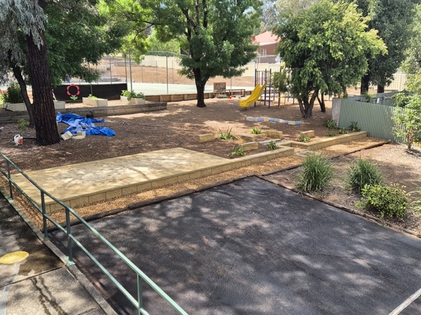 A retaining wall, paving and steps by MR Landscapes