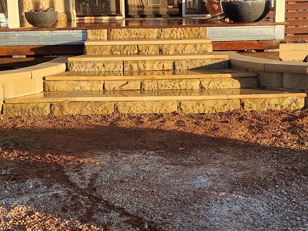 Sandstone steps and hardscaping by MR Landscapes