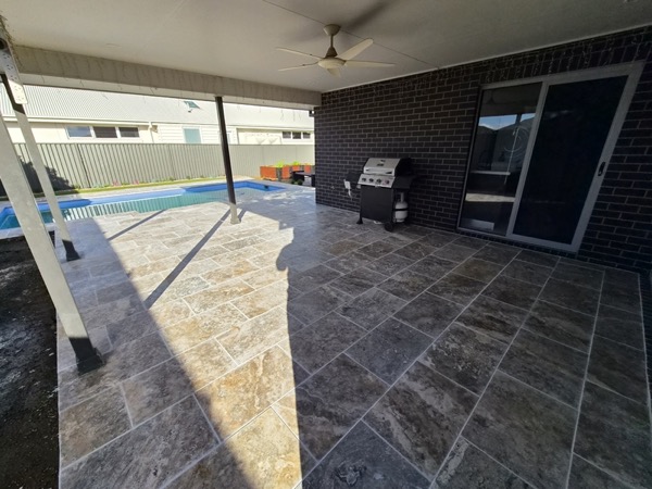A paved alfresco area by MR Landscapes