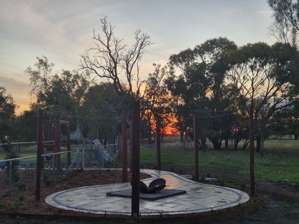 A firepit area at sunset by MR Landscapes