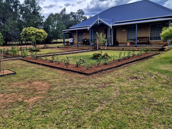 A landscaped homestead garden and lawn by MR Landscapes